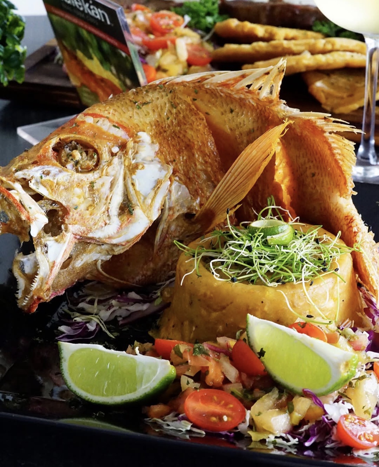 Chillo con Mofongo · Whole Snapper with Mofongo
